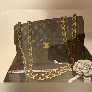 Amanda Greenwood Art designer frame featuring a Chanel quilted purse, 14”x14”